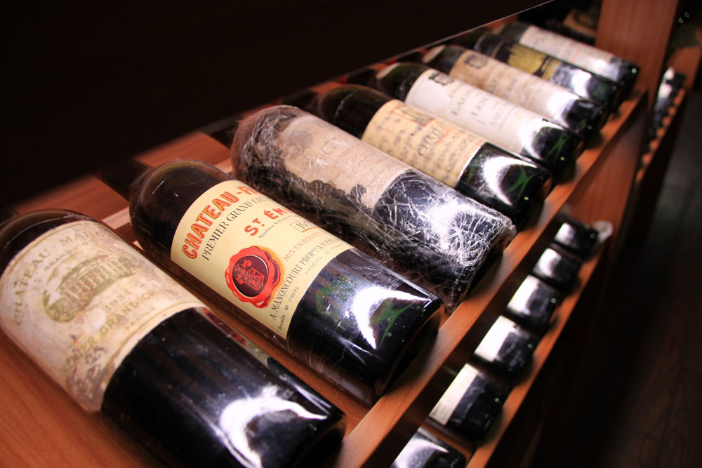 Chen's wine cellar includes expensive bottles of Chateau Margaux from 1934